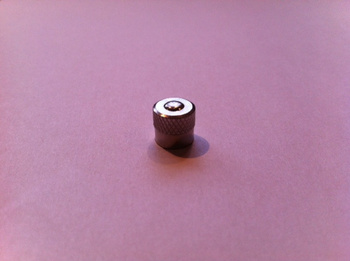 Valve cap shock/fork metal